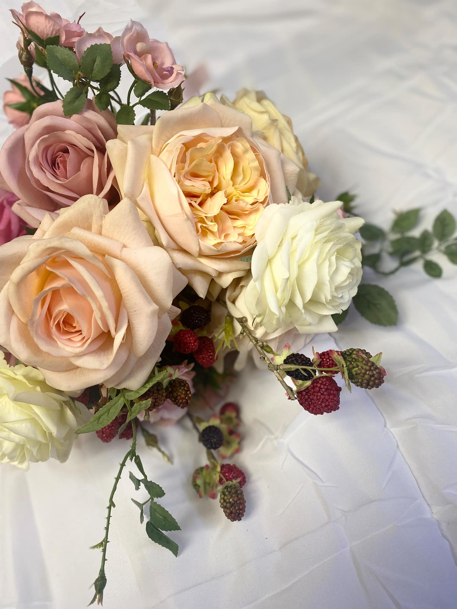 Champagne Peach Pink ivory Blush realistic artificial flowers Bridal Bouquet with austin roses, berries, and alberta wild roses by Love & Lilacs Wedding Florist of Edmonton Alberta