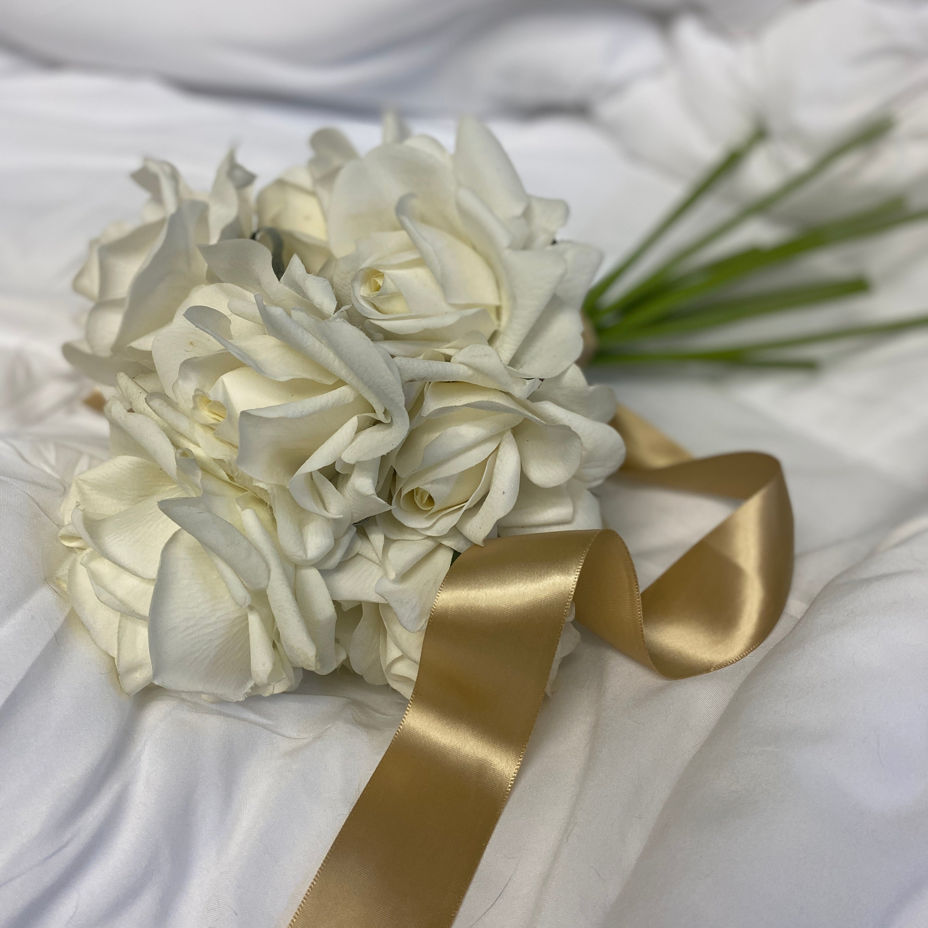 Modern white Ivory faux classic artificial rose flower bouquet with gold champagne satin ribbon by faux florist Love & Lilacs Boutique of Edmonton Alberta Canada